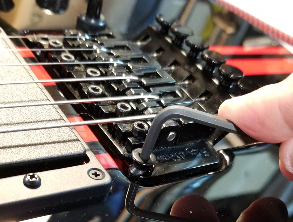 Locking shop bridge guitar